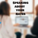 two people in front of a computer